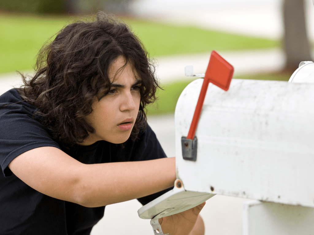 male checking mailbox